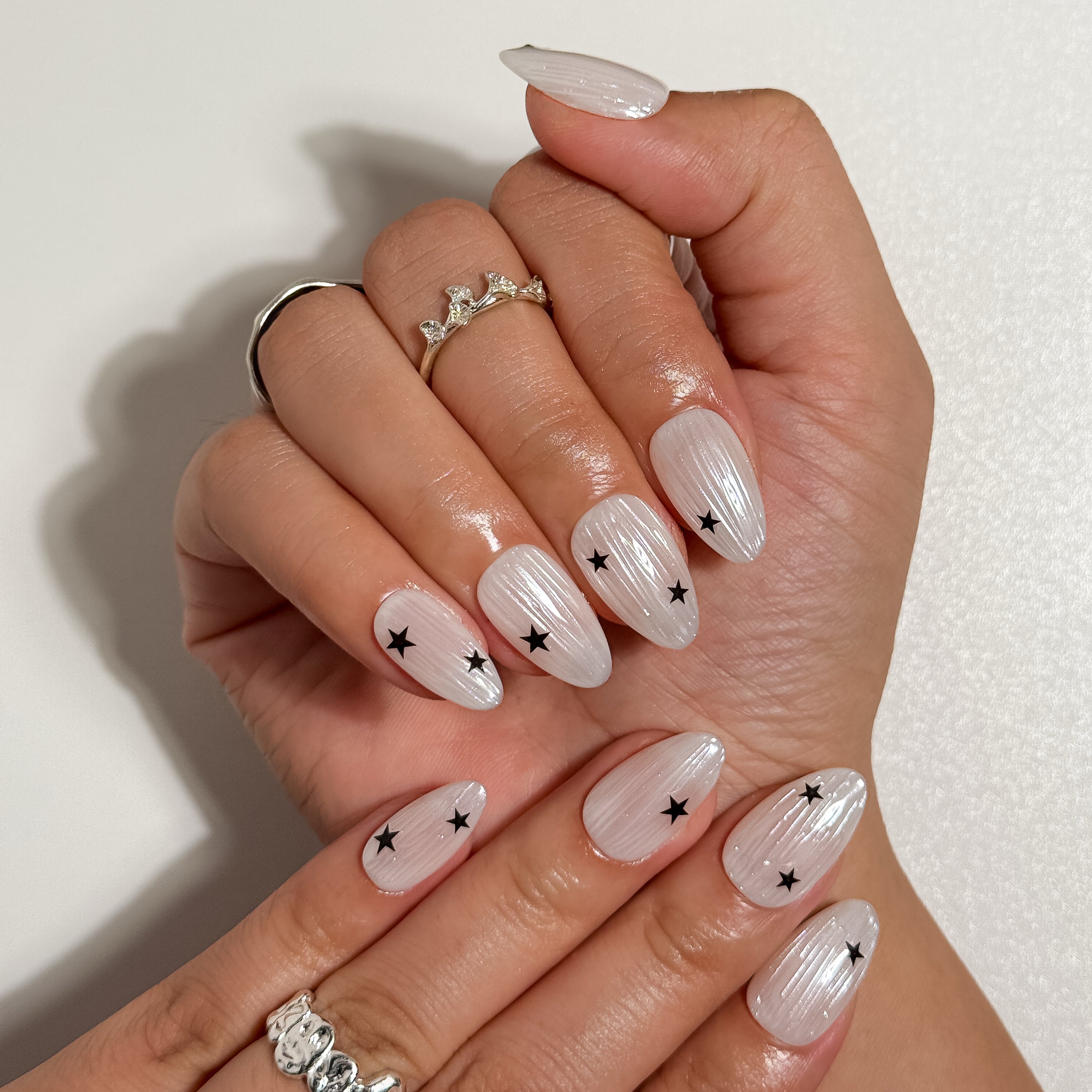 Starlight Frost Frosty White Shimmer Press on Nails with Black Stars